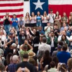 Who’s REALLY Funding Cornyn? Names Will Shock…. A large crowd at a political rally with people cheering and taking photos
