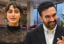 MAMDANI Sparks PANIC—Homeowners Scrambling to Escape… Two professionals engaged in conversation in a modern office setting