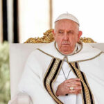 SHOCKING POPE Crisis — Vatican Confirms Investigation… Elderly man in white robe sitting on chair.