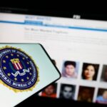 INTENSE White House Security Fail – What Really Happened? FBI logo displayed on a smartphone with a website showing wanted individuals in the background