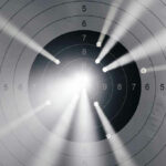 Prosecutor’s TROPHY Case TARGETS CELEBRITY Target with multiple bullet holes and light rays.
