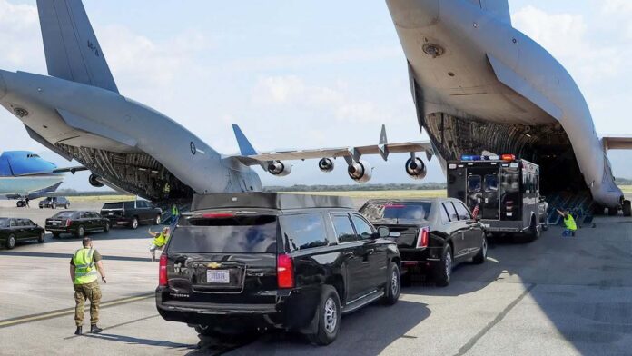 SHOCKING-Presidential-Transport-Fleet-EXPOSED Military aircraft unloading vehicles at an airport with security personnel present