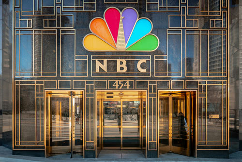 shutterstock1709471473-2jpg NBC building entrance with colorful peacock logo.