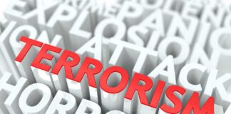 Terrorism word in red among white 3D text