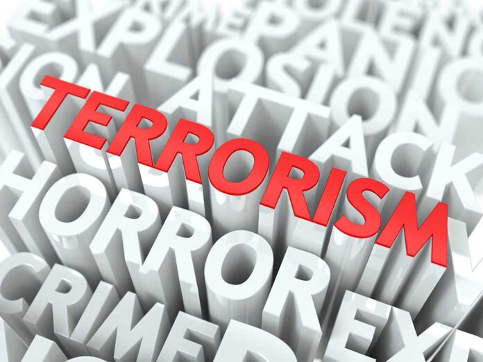 Terrorism,Concept.,The,Word,Of,Red,Color,Located,Over,Text Terrorism word in red among white 3D text