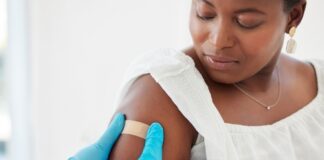 A healthcare professional administering a vaccine to a patient