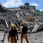 A Nation Buried: Venezuela Faces Its Deadliest Hours Rescue workers survey collapsed building debris