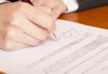 California’s BEDROOM TEST For Contracts? Hand signing a document with a pen