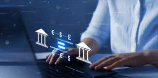 Person typing, banking and currency exchange symbols displayed.