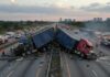 New Details Reveal Driver’s High Blood Alcohol Level Two overturned trucks blocking a highway with emergency responders at the scene