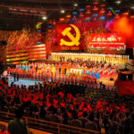 America Loses the Voice Behind “Y.M.C.A.” A large crowd at a celebratory event with performers on stage and fireworks in the background