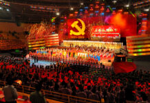 America Loses the Voice Behind “Y.M.C.A.” A large crowd at a celebratory event with performers on stage and fireworks in the background