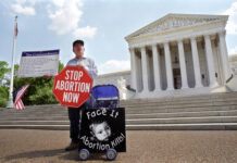 Person protesting abortion outside the United States Supreme Court.