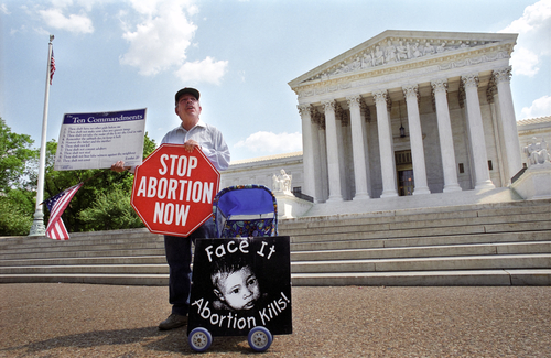 Person protesting abortion outside the United States Supreme Court.